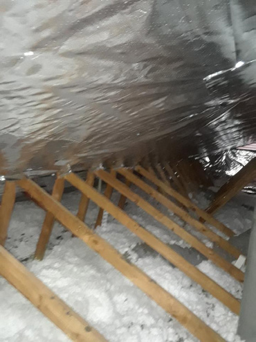 ECO-Shield-Blanket reflective barrier installed inside an attic